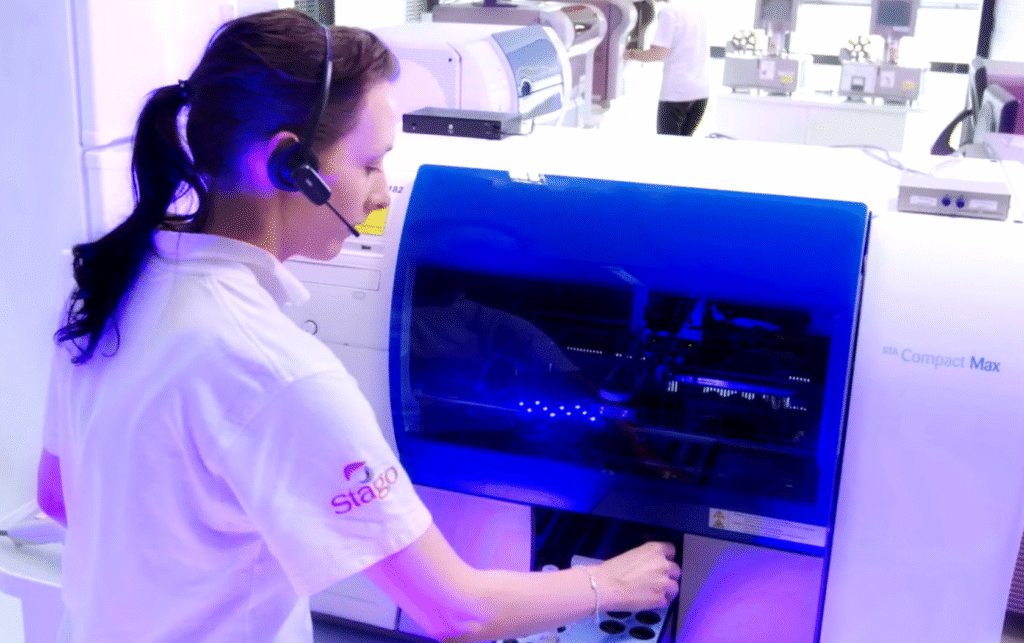 Stago case study resco technician using in vitro blood diagnostic machine in hospital 1024x643